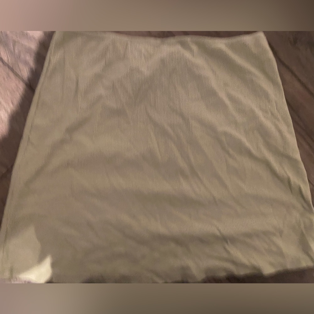 Princess Polly Light sage green mini skirt (website doesn’t show the color)